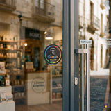 Adhesiu NFC rodó a la porta de vidre d'una botiga · Tocky