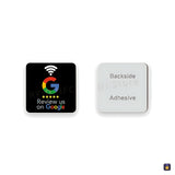 Schwarzer 30-mm-NFC-Sticker „Review us on Google“ und seine Klebeseite · Tocky
